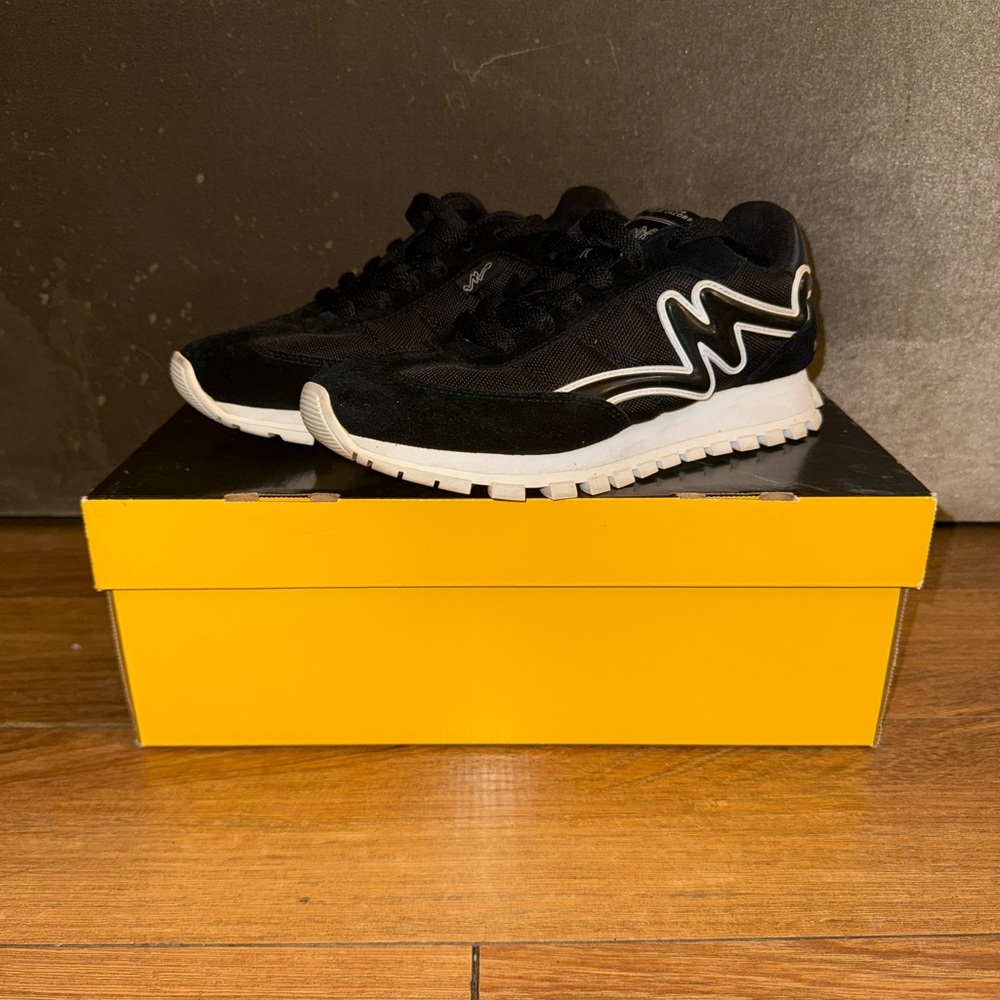 Marc Jacob’s black & white The Jogger Sneaker